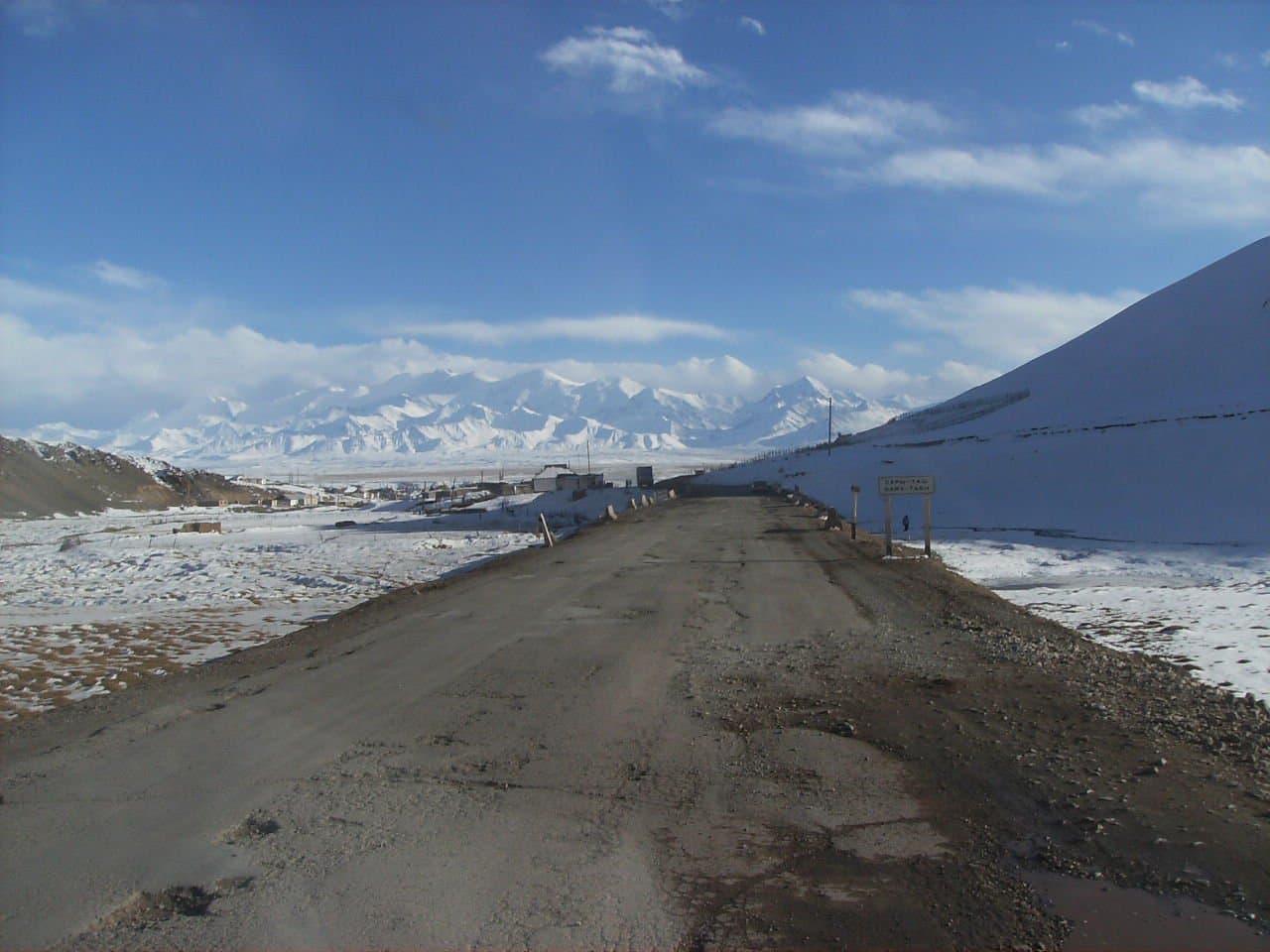 The road towards Sary-Tash with the snow-capped Trans-Alay range ahead